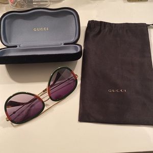 Authentic Gucci Sunglasses, used no more than couple times,original case
